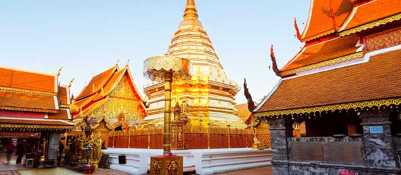 The golden chedi of Wat Phra That Doi Suthep on its terrace above Chiang Mai